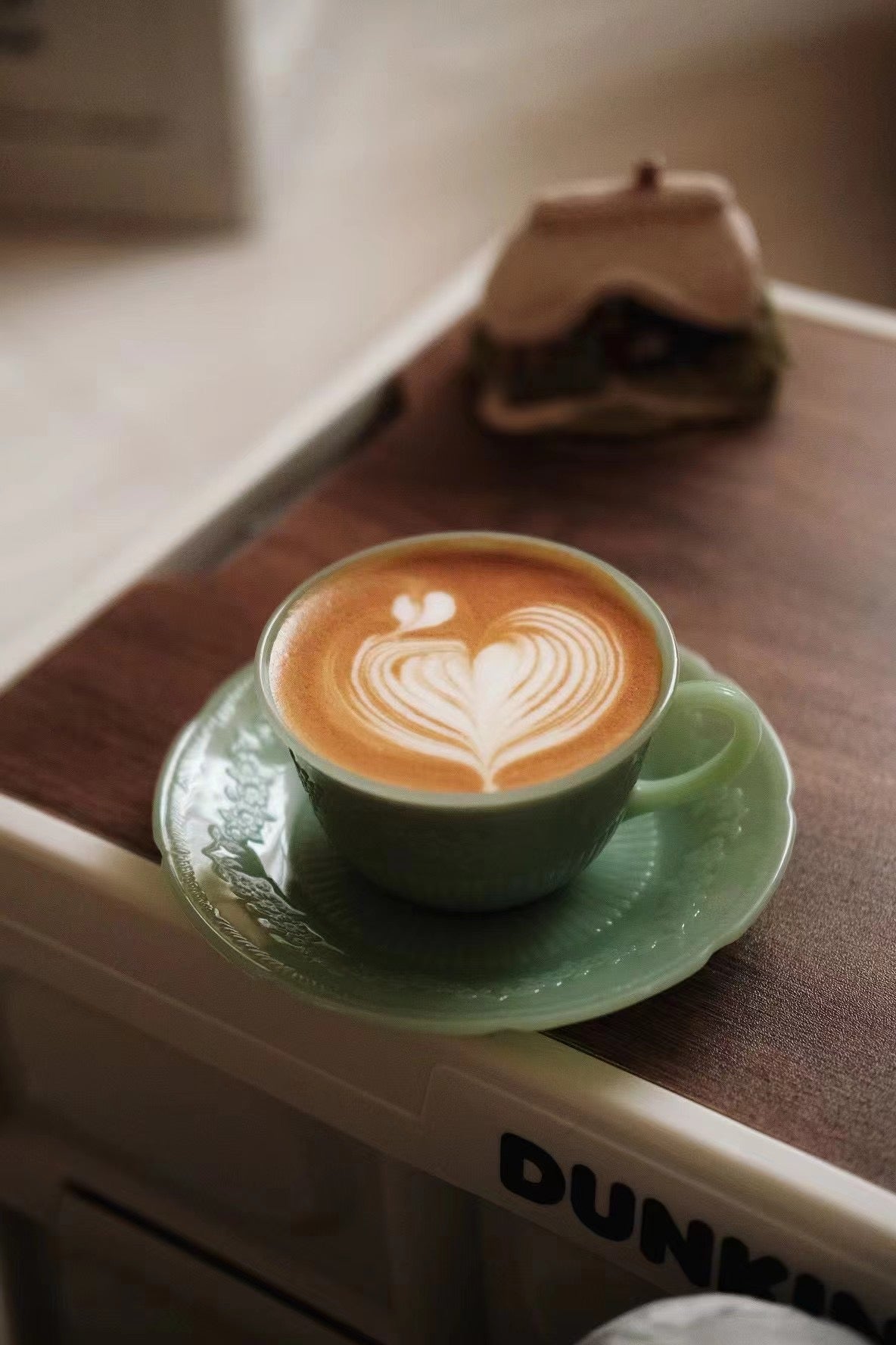 Vintage cup and coffee in warm afternoon light
